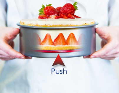 תבנית עגולה 23 ס”מ גובה חיצוני 8.5 פנימי 7.5 ס״מ hard anodise כסוף עם בסיס נשלף בעל פטנט עולמי מסדרת Push Pan מבית OLIVIER