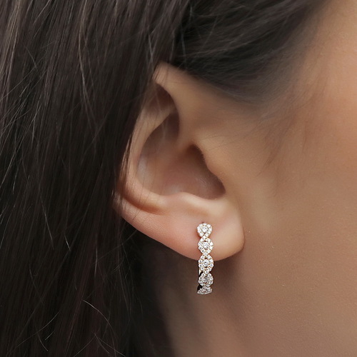 עגילי יהלומים בעיצוב אינפיניטי 0.63ct מזהב 14K